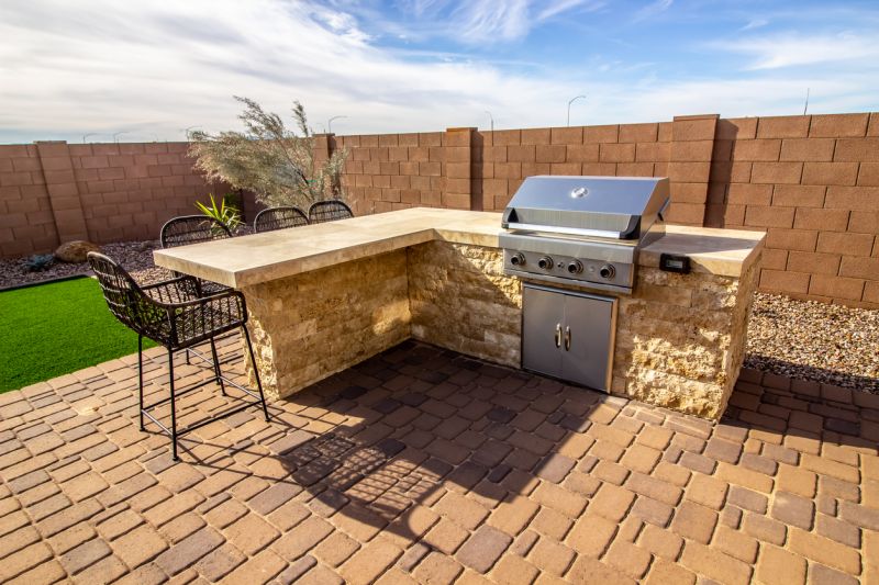 Paver patio with outdoor kitchen